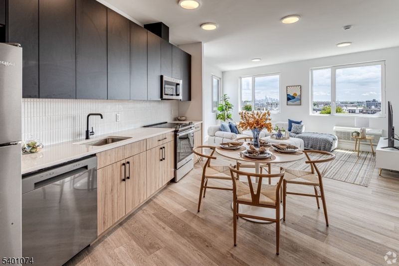 Dining room, Interior, Kitchen, Recessed Lighting, Stainless Steel Appliances, Wood Texture Flooring