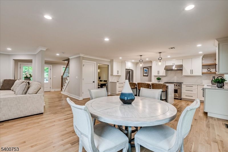 Dining room, Interior, Kitchen, Pendant Lights, Recessed Lighting, Stainless Steel Appliances, Wood Texture Flooring