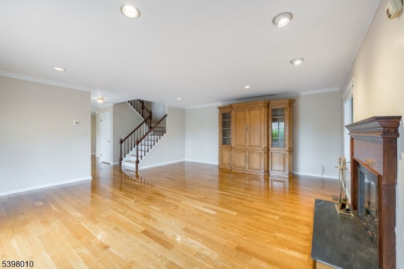 Empty room, Fireplace, Interior, Recessed Lighting, Wood Texture Flooring