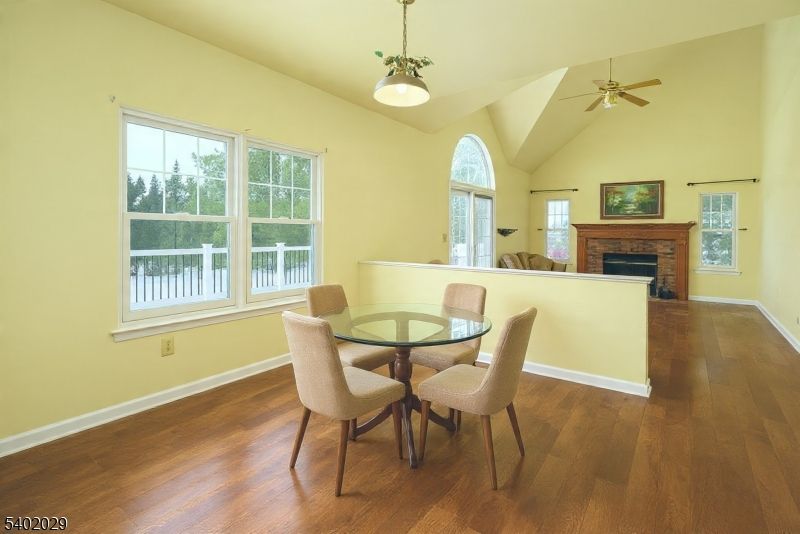 Dining room, Fireplace, Interior, Pendant Lights, Wood Texture Flooring