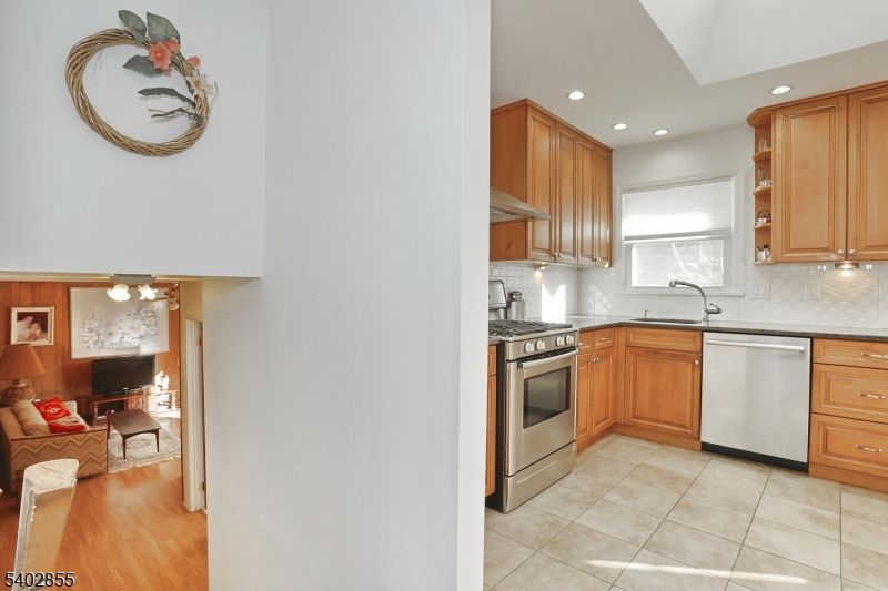 Dining room, Interior, Kitchen, Recessed Lighting, Stainless Steel Appliances, Wood Texture Flooring