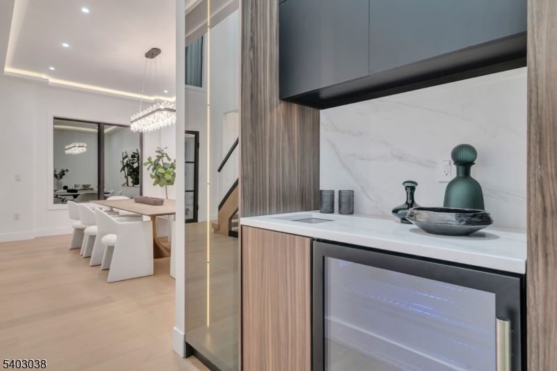 Chandelier, Dining room, Interior, Kitchen, Marble Walls, Pendant Lights, Recessed Lighting, Wood Texture Flooring