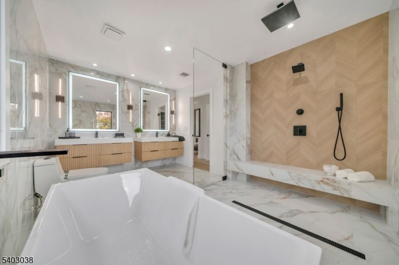 Bathroom, Dual Sink Vanities, Free Standing Baths, Glass Shower, Interior, Marble, Marble Walls, Recessed Lighting