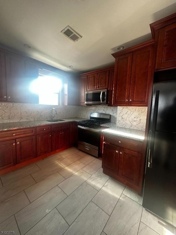 Interior, Kitchen, Marble Walls, Stainless Steel Appliances