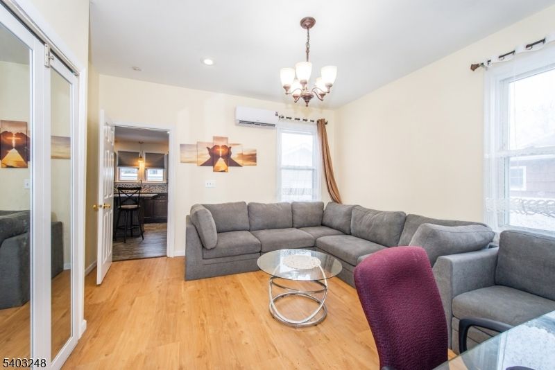 Chandelier, Interior, Living room, Recessed Lighting, Wood Texture Flooring