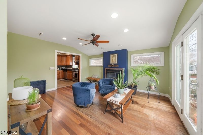 Fireplace, Interior, Living room, Recessed Lighting, Wood Texture Flooring