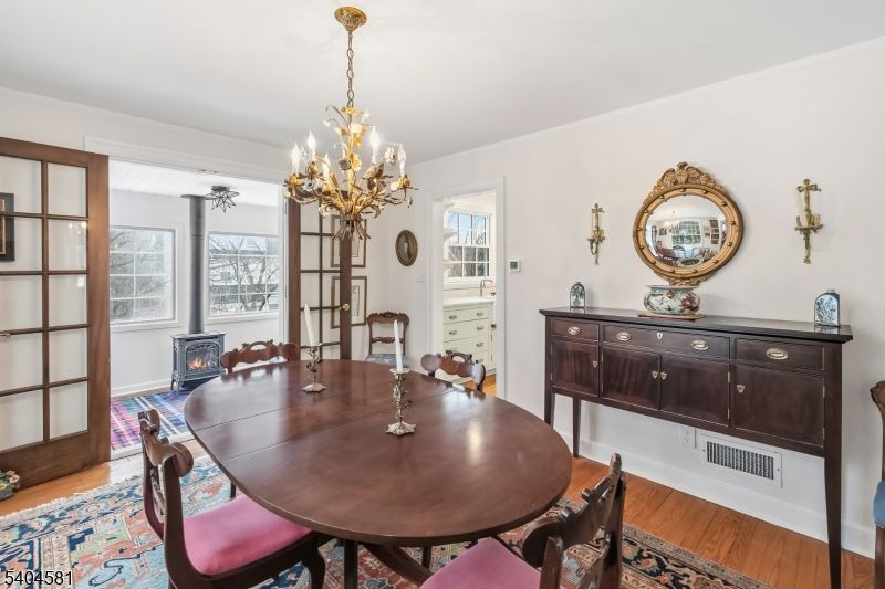 Chandelier, Dining room, Fireplace, Interior, Wood Texture Flooring