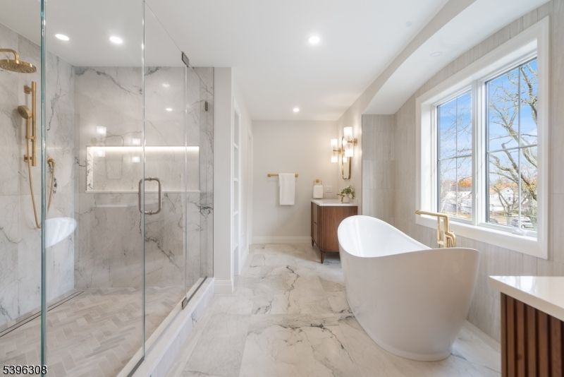Bathroom, Free Standing Baths, Glass Shower, Interior, Marble, Marble Walls, Recessed Lighting
