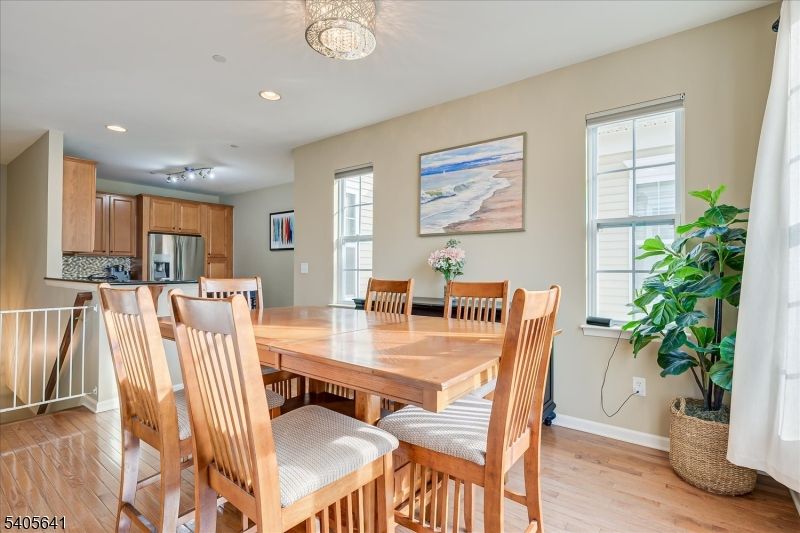 Dining room, Interior, Kitchen, Recessed Lighting, Stainless Steel Appliances, Wood Texture Flooring