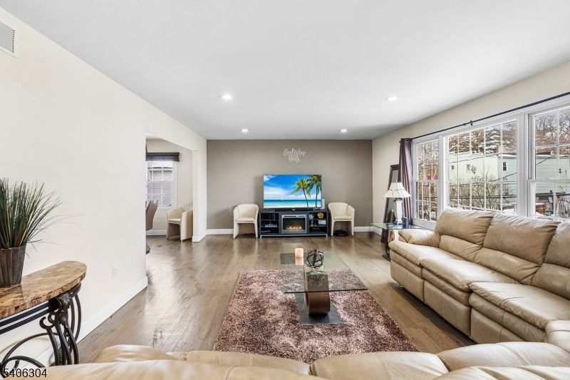 Fireplace, Interior, Living room, Recessed Lighting, Wood Texture Flooring