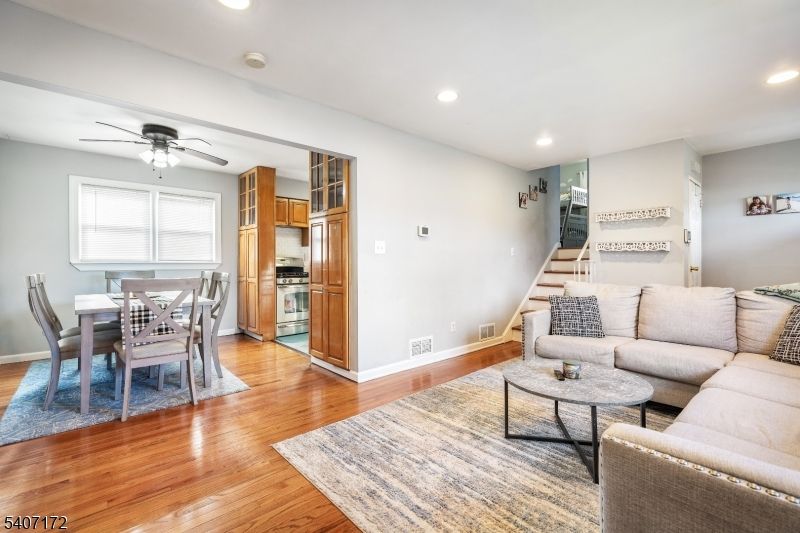 Dining room, Interior, Kitchen, Living room, Recessed Lighting, Stainless Steel Appliances, Wood Texture Flooring