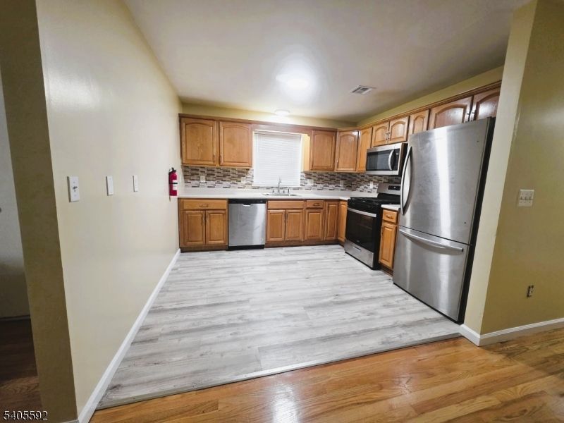Interior, Kitchen, Stainless Steel Appliances, Wood Texture Flooring