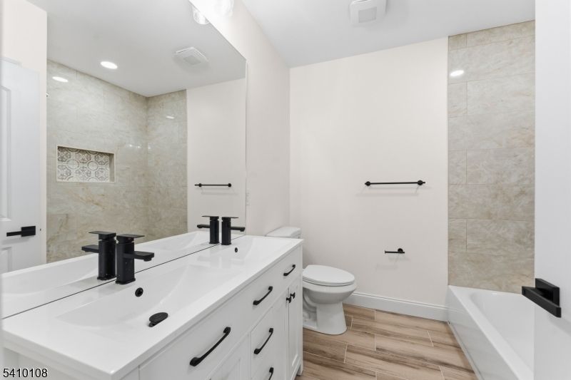 Bathroom, Dual Sink Vanities, Interior, Recessed Lighting, Wood Texture Flooring