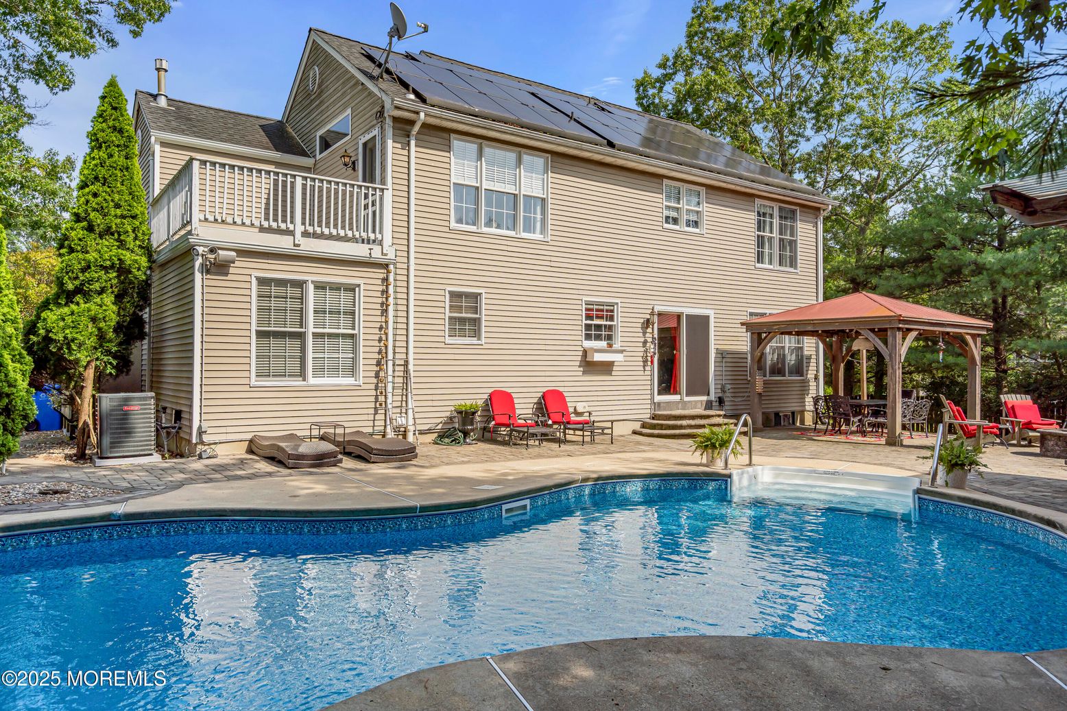 Exterior, Pool, Solar Panels