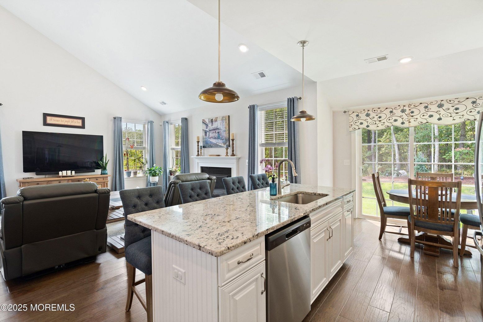 Dining room, Fireplace, Interior, Kitchen, Living room, Pendant Lights, Recessed Lighting, Stainless Steel Appliances, Wood Texture Flooring