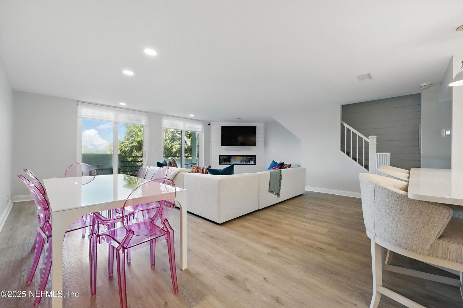 Dining room, Fireplace, Interior, Living room, Recessed Lighting, Wood Texture Flooring