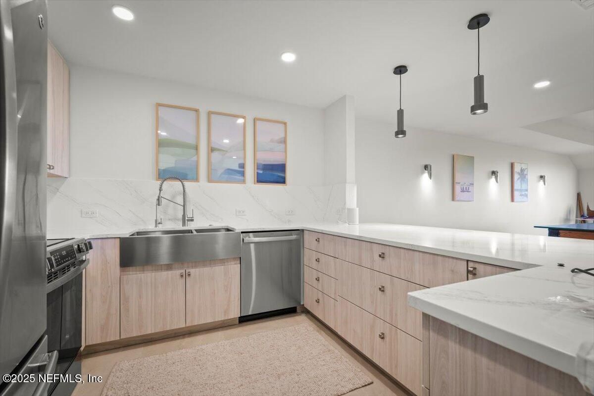 Interior, Kitchen, Marble Walls, Pendant Lights, Recessed Lighting, Stainless Steel Appliances