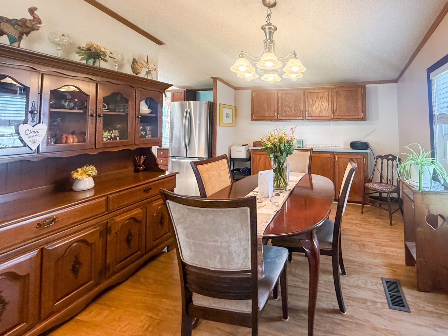 Chandelier, Dining room, Interior, Kitchen, Stainless Steel Appliances, Wood Texture Flooring