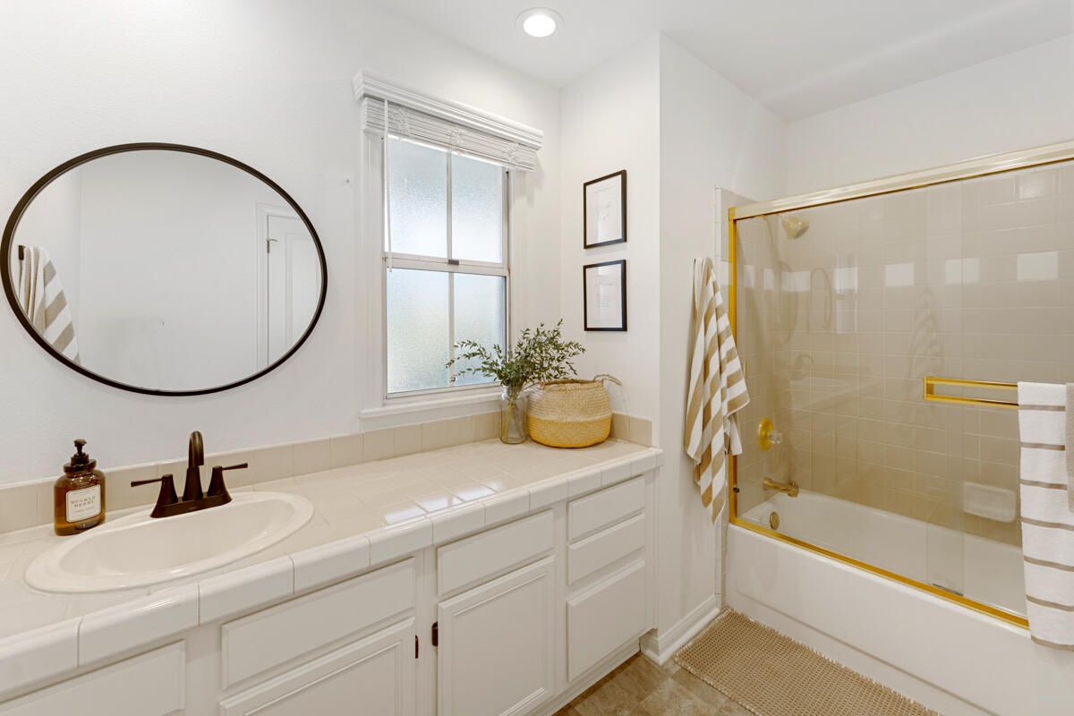 Bathroom, Dual Sink Vanities, Glass Shower, Interior, Recessed Lighting, Tile Countertops