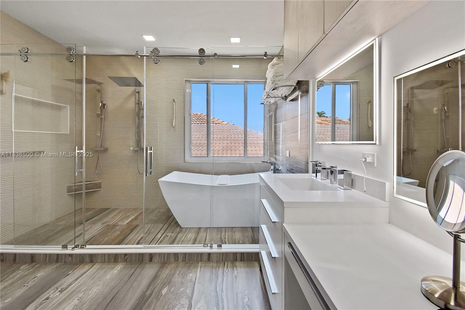 Bathroom, Free Standing Baths, Glass Shower, Interior, Recessed Lighting, Wood Texture Flooring