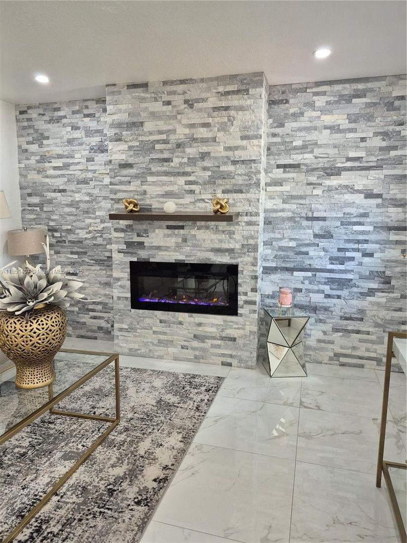 Fireplace, Interior, Marble, Recessed Lighting, Stone Walls