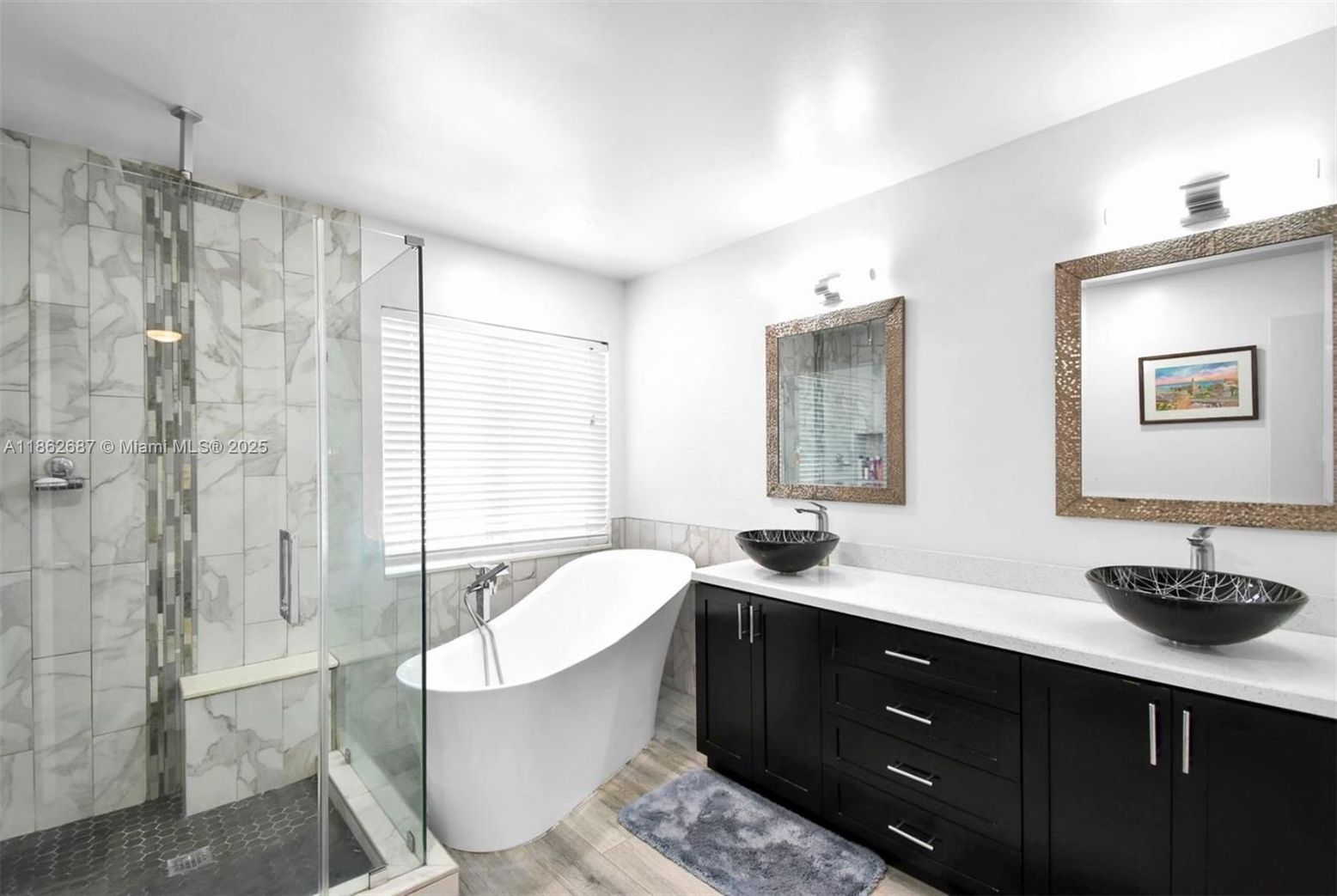 Bathroom, Dual Sink Vanities, Free Standing Baths, Glass Shower, Interior, Marble Walls, Wood Texture Flooring