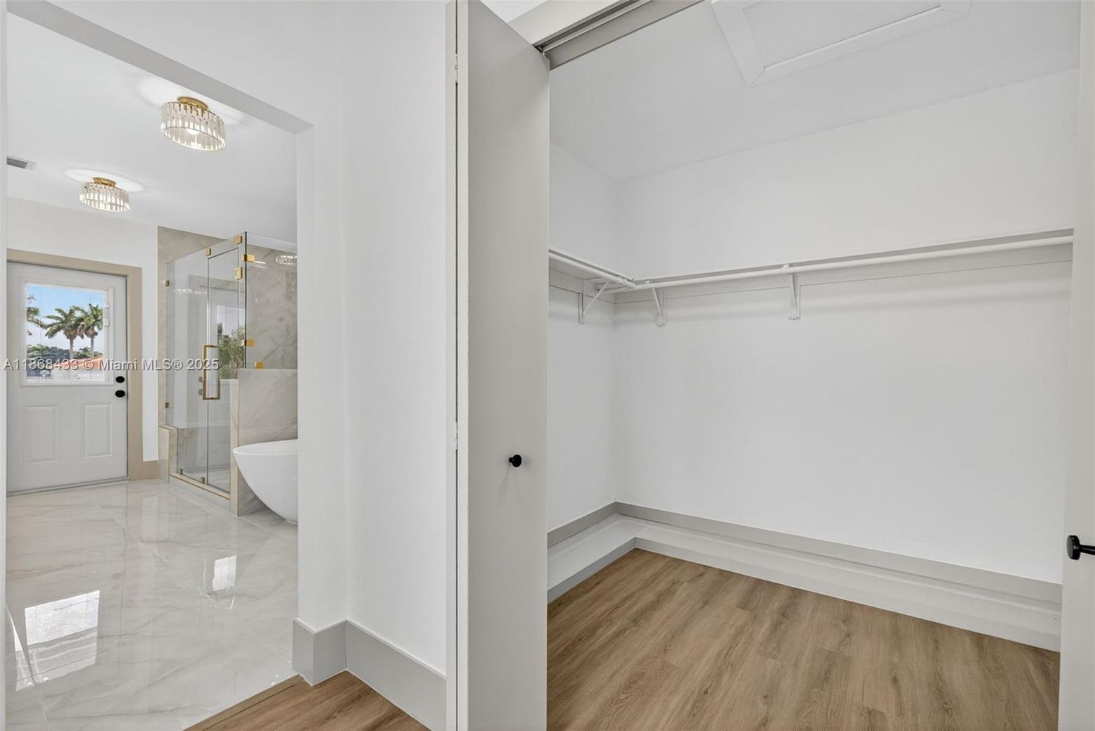 Bathroom, Free Standing Baths, Glass Shower, Interior, Marble, Walk-in Closets, Wood Texture Flooring