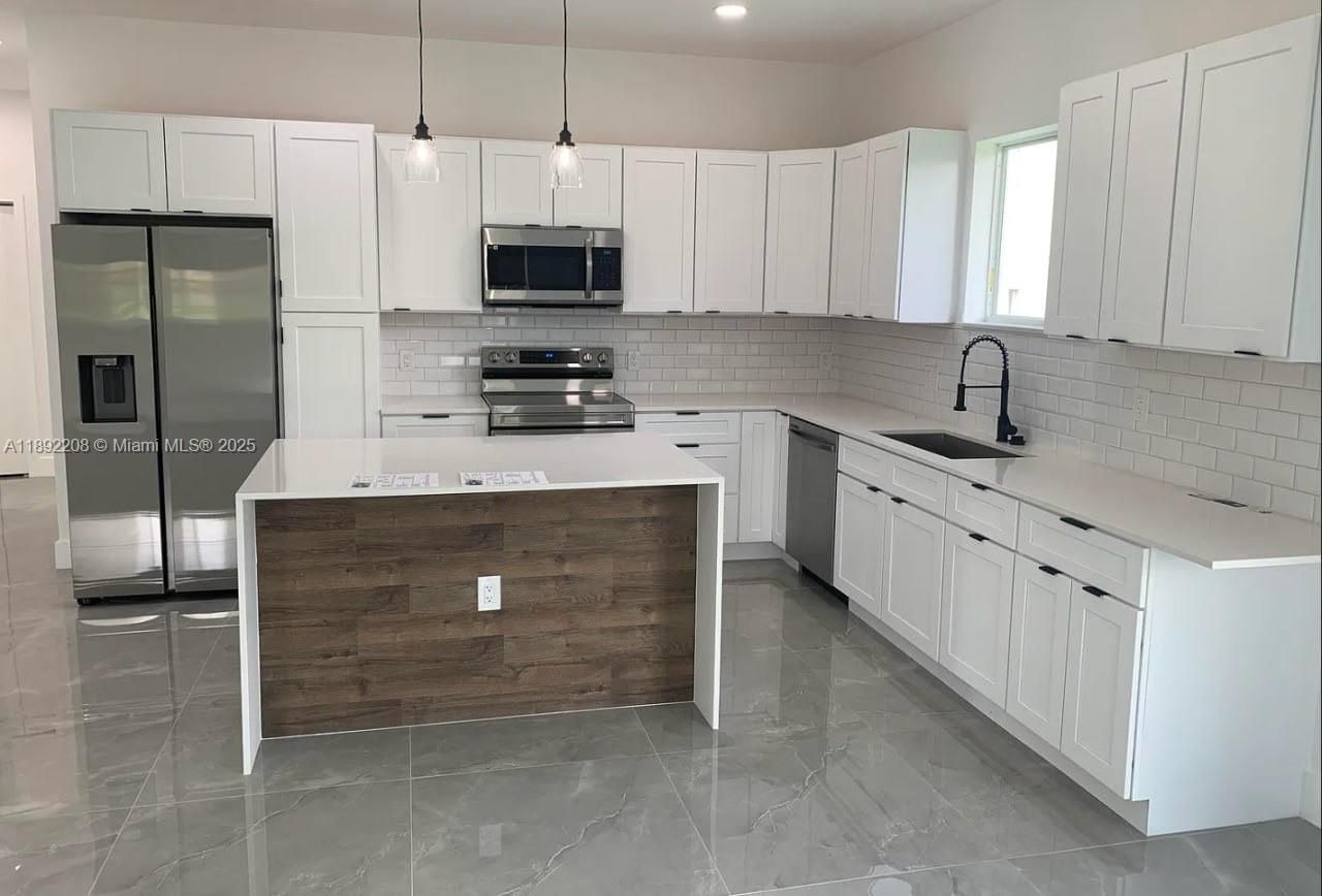 Interior, Kitchen, Marble, Pendant Lights, Recessed Lighting, Stainless Steel Appliances