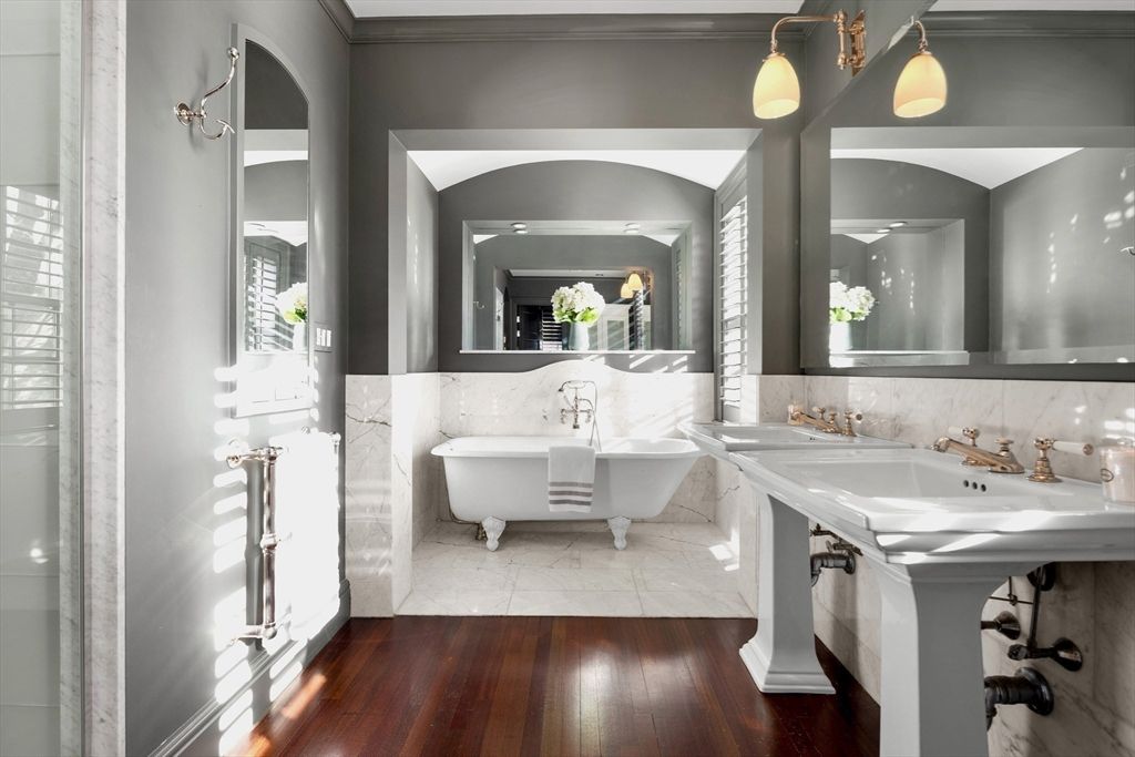 Bathroom, Dual Sink Vanities, Free Standing Baths, Interior, Marble, Pendant Lights, Wood Texture Flooring