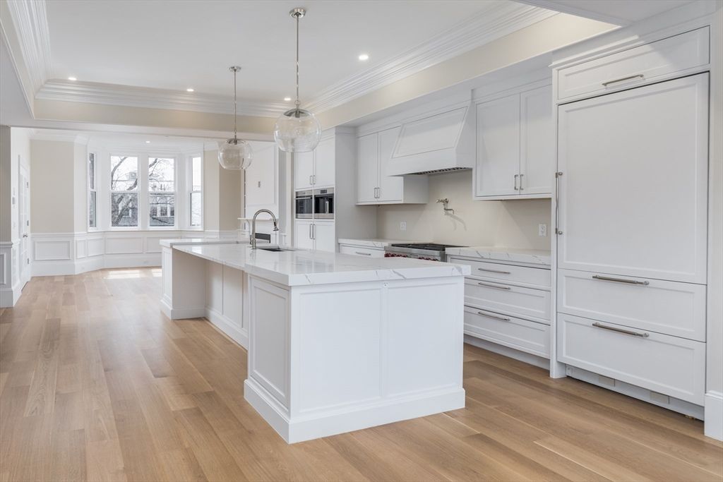 Fireplace, Interior, Kitchen, Pendant Lights, Recessed Lighting, Stainless Steel Appliances, Wood Texture Flooring