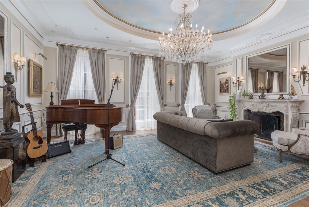 Chandelier, Fireplace, Interior, Living room, Piano, Recessed Lighting, Wood Texture Flooring