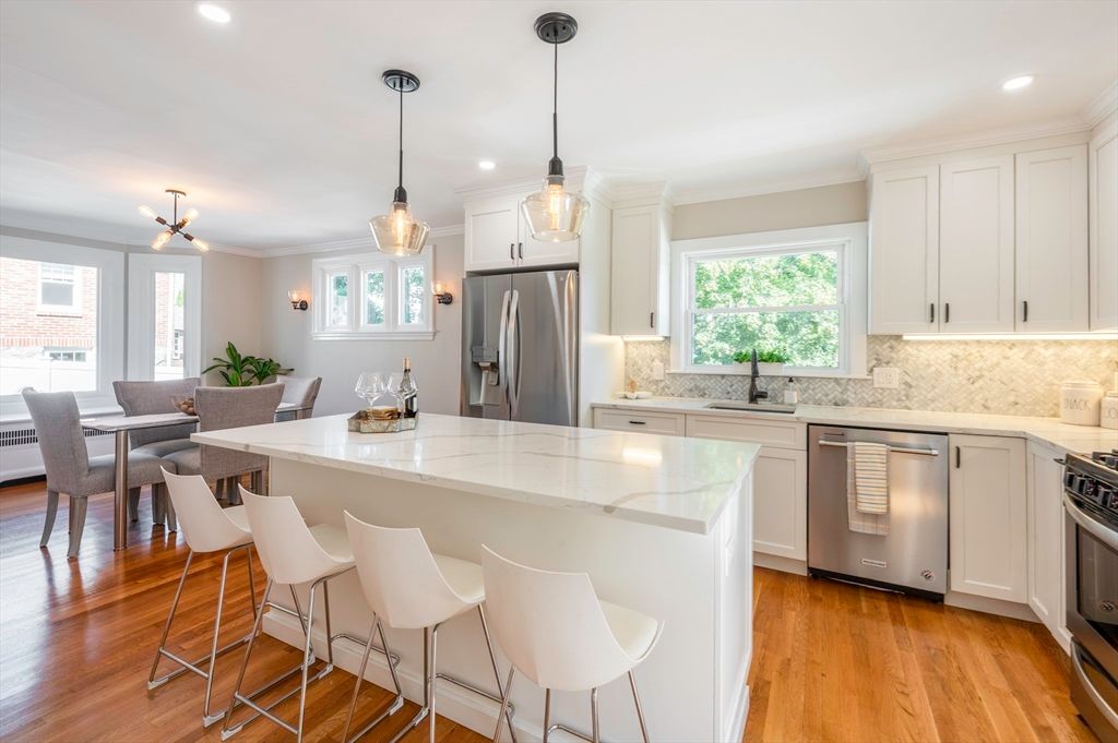 Dining room, Interior, Kitchen, Pendant Lights, Recessed Lighting, Stainless Steel Appliances, Wood Texture Flooring