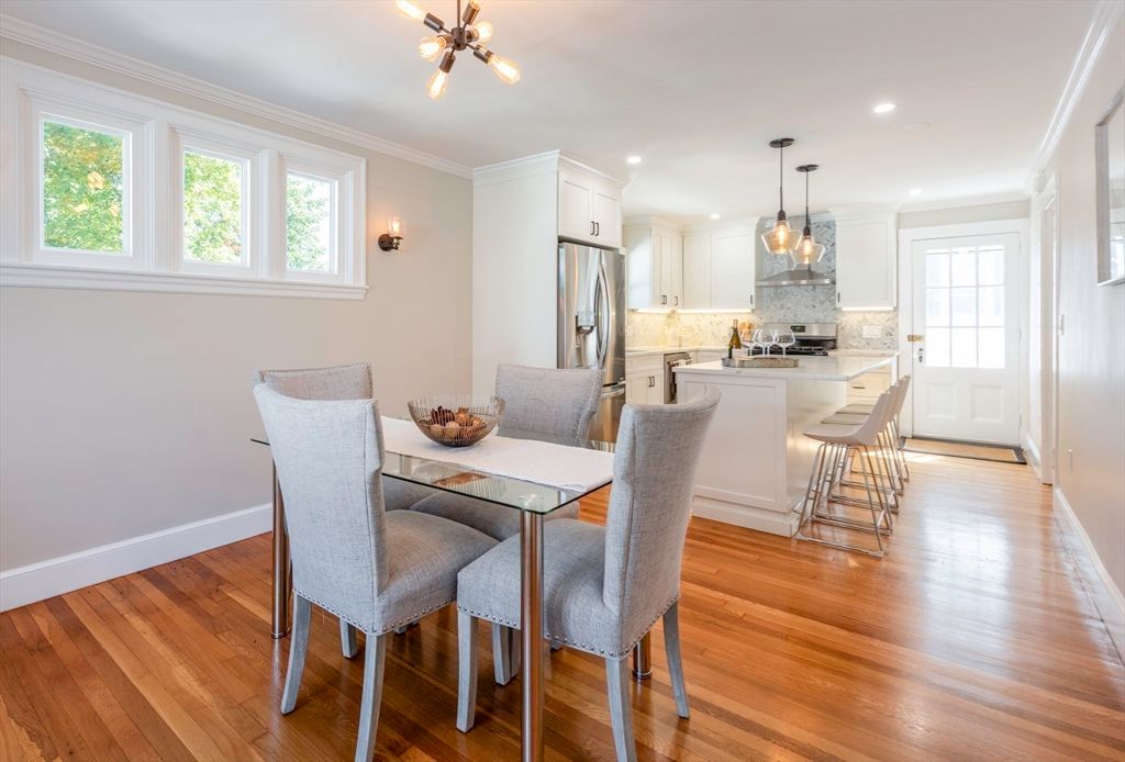 Dining room, Interior, Kitchen, Pendant Lights, Recessed Lighting, Stainless Steel Appliances, Wood Texture Flooring