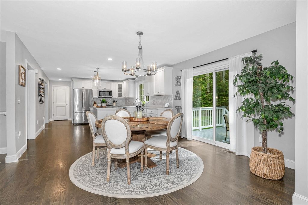Chandelier, Dining room, Interior, Kitchen, Recessed Lighting, Stainless Steel Appliances, Wood Texture Flooring
