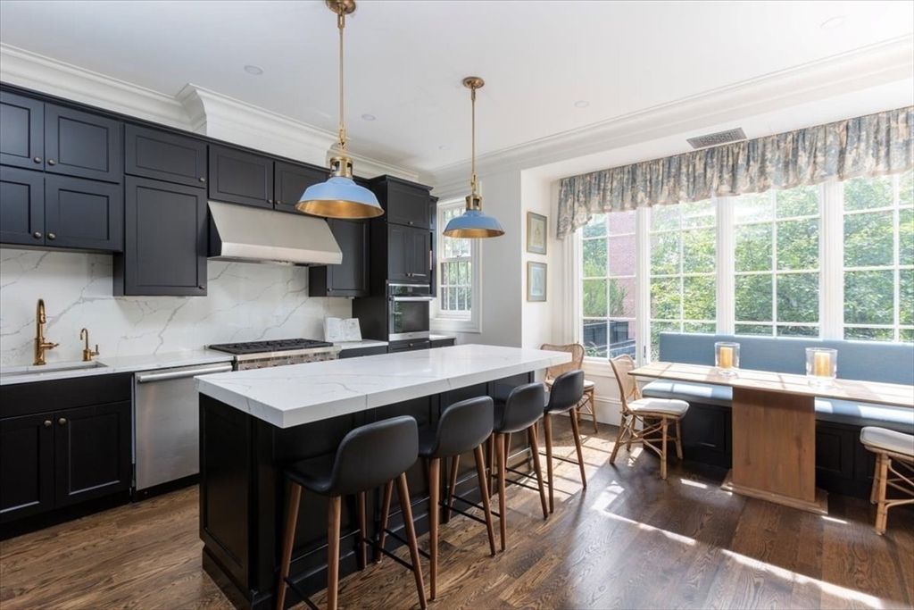 Dining room, Interior, Kitchen, Marble Walls, Pendant Lights, Recessed Lighting, Stainless Steel Appliances, Wood Texture Flooring