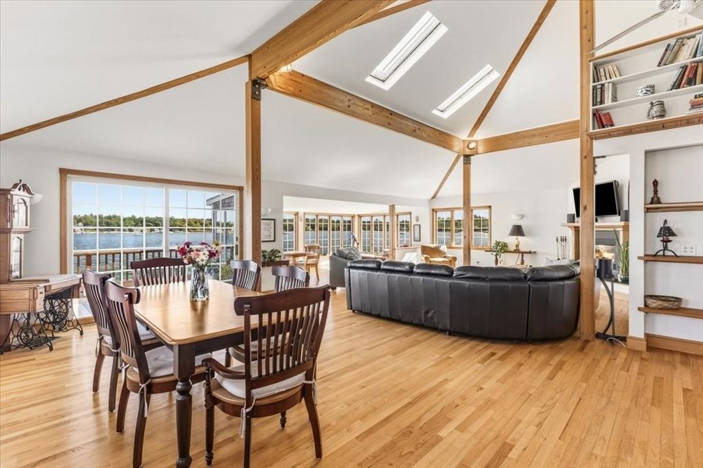 Dining room, Fireplace, Interior, Living room, Water, Wooden Beams, Wood Texture Flooring