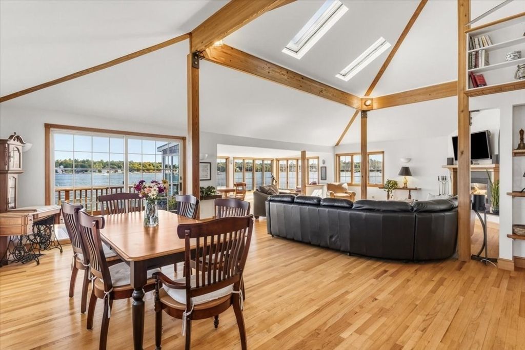 Dining room, Fireplace, Interior, Living room, Water, Wooden Beams, Wood Texture Flooring