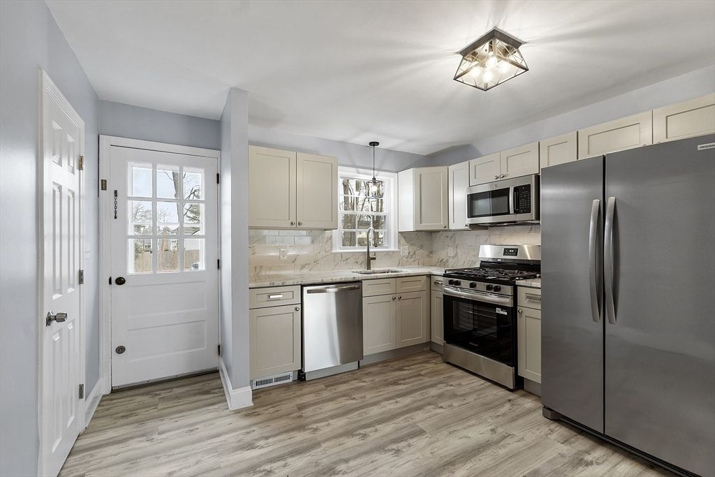 Interior, Kitchen, Pendant Lights, Stainless Steel Appliances, Wood Texture Flooring