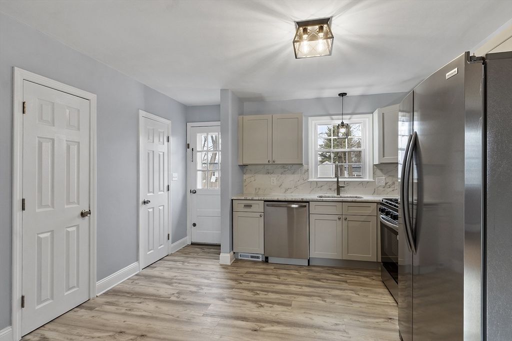 Interior, Kitchen, Marble Walls, Stainless Steel Appliances, Wood Texture Flooring