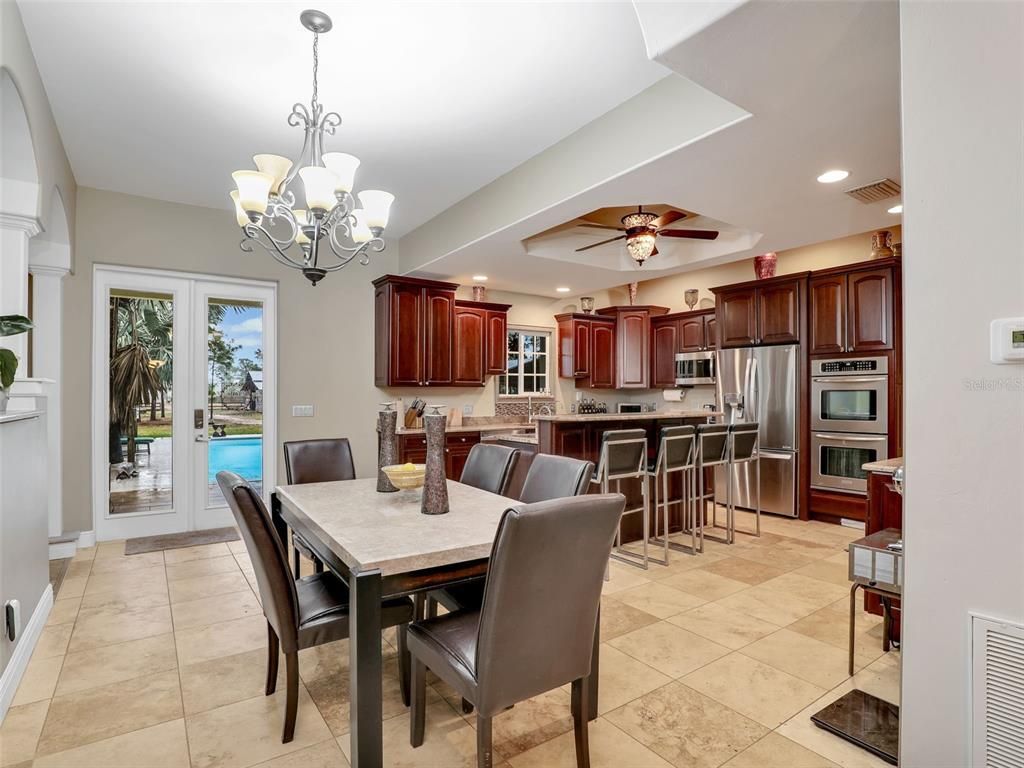 Chandelier, Dining room, Interior, Kitchen, Recessed Lighting, Stainless Steel Appliances