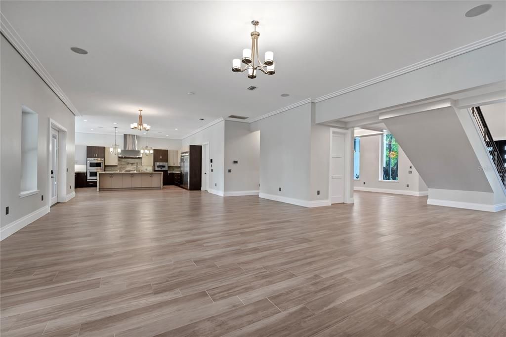 Chandelier, Empty room, Interior, Kitchen, Pendant Lights, Stainless Steel Appliances, Wood Texture Flooring