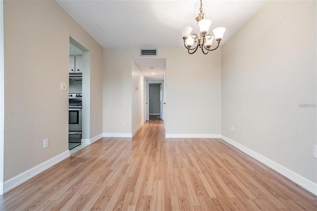 Chandelier, Empty room, Interior, Recessed Lighting, Wood Texture Flooring