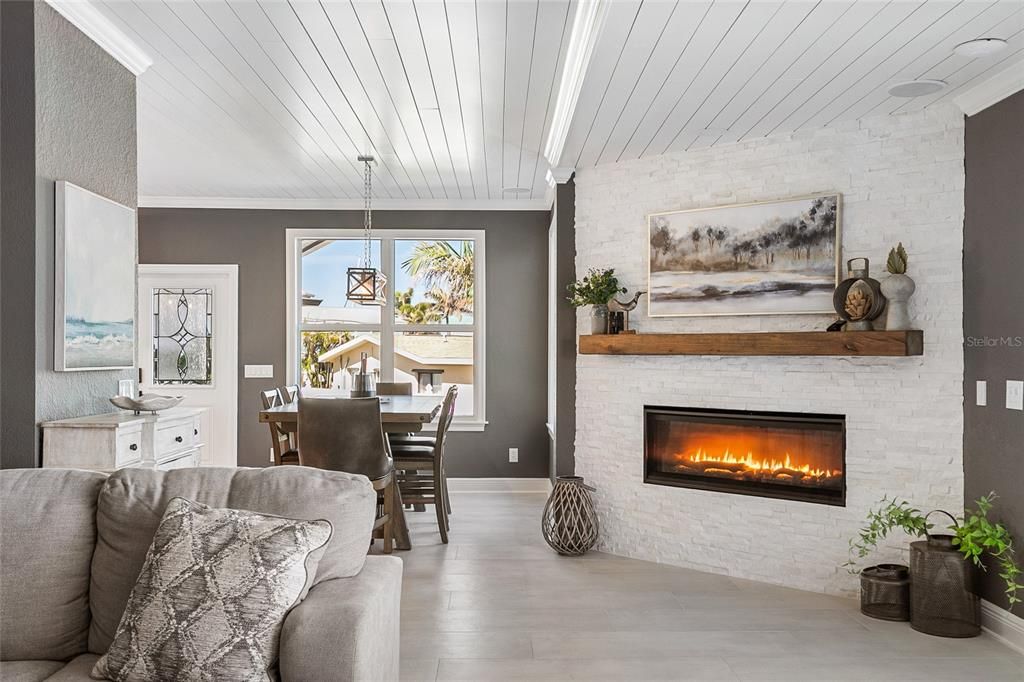 Dining room, Fireplace, Interior, Pendant Lights, Stone Walls, Wood Texture Flooring