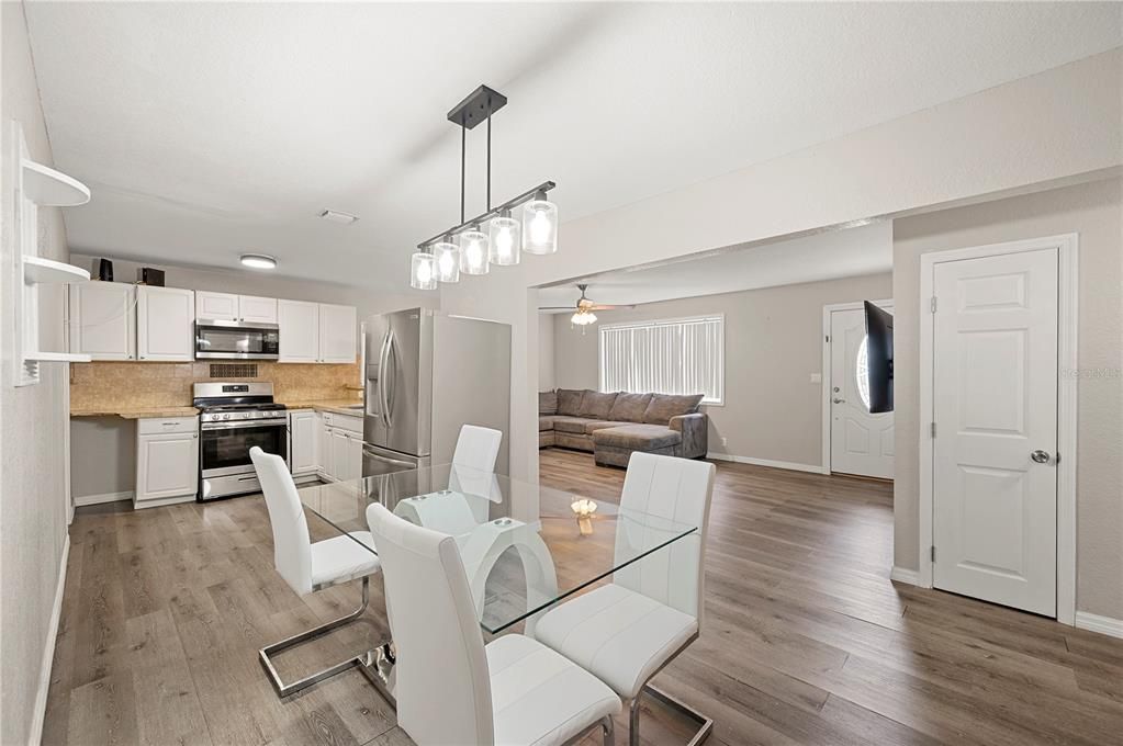 Dining room, Interior, Kitchen, Living room, Pendant Lights, Stainless Steel Appliances, Wood Texture Flooring