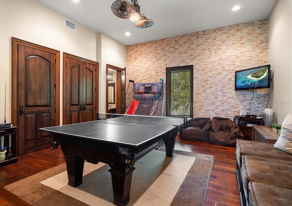 Game Room, Interior, Recessed Lighting, Stone Walls, Wood Texture Flooring