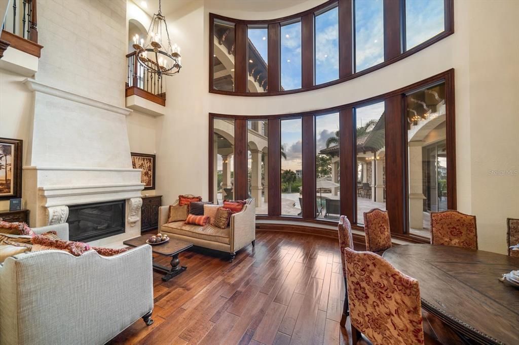 Chandelier, Dining room, Fireplace, Interior, Living room, Pendant Lights, Wood Texture Flooring