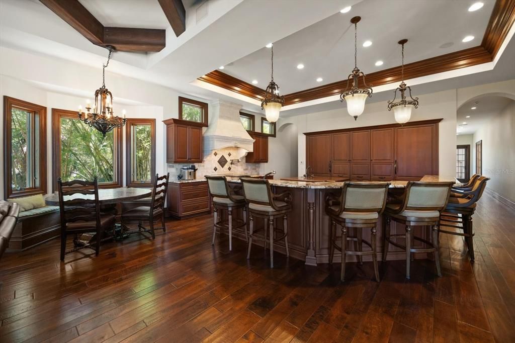 Chandelier, Dining room, Interior, Kitchen, Pendant Lights, Recessed Lighting, Stainless Steel Appliances, Wooden Beams, Wood Texture Flooring