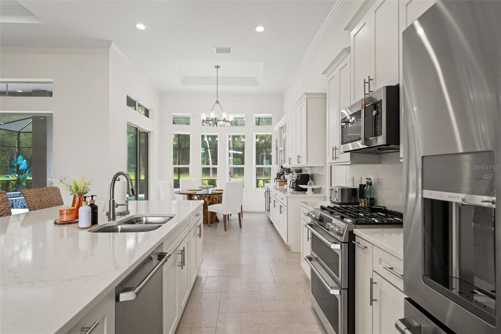 Chandelier, Dining room, Interior, Kitchen, Recessed Lighting, Stainless Steel Appliances