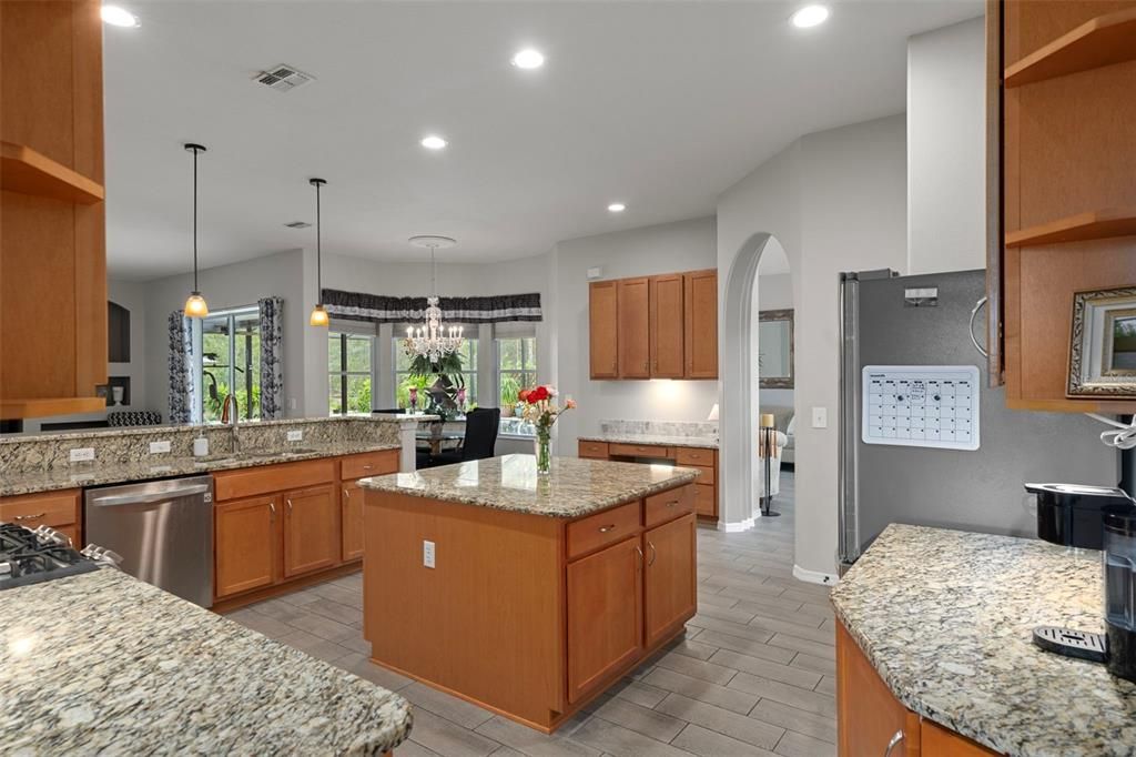 Chandelier, Dining room, Interior, Kitchen, Pendant Lights, Recessed Lighting, Stainless Steel Appliances