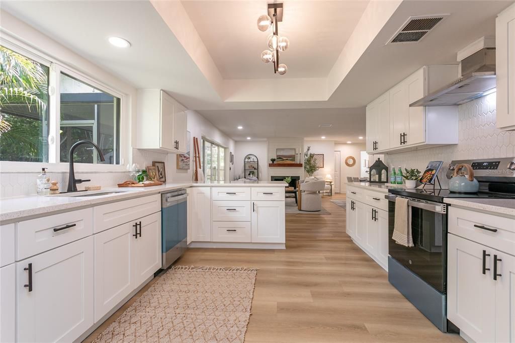 Interior, Kitchen, Pendant Lights, Recessed Lighting, Stainless Steel Appliances, Wood Texture Flooring